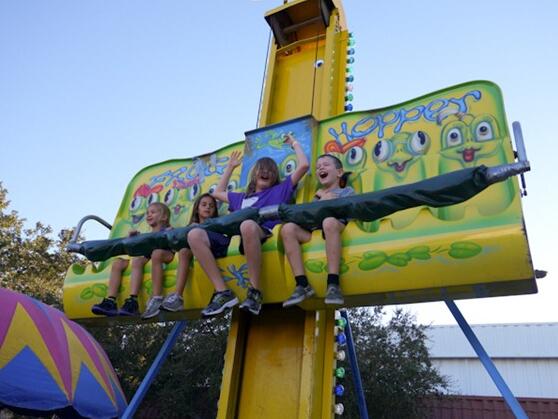 Going On The Frog Hopper Ride At The Fair