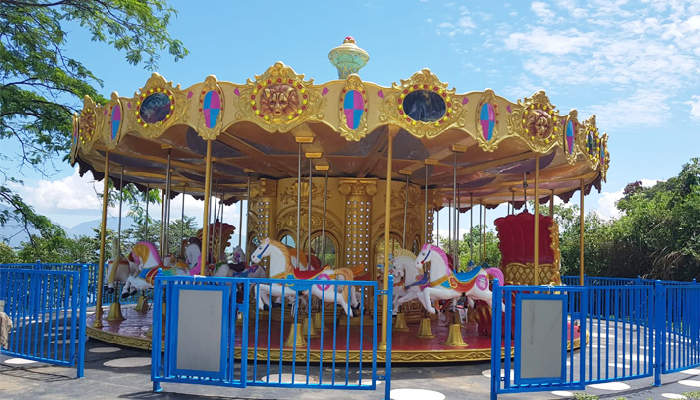 Grand carousel ride in the amusement park